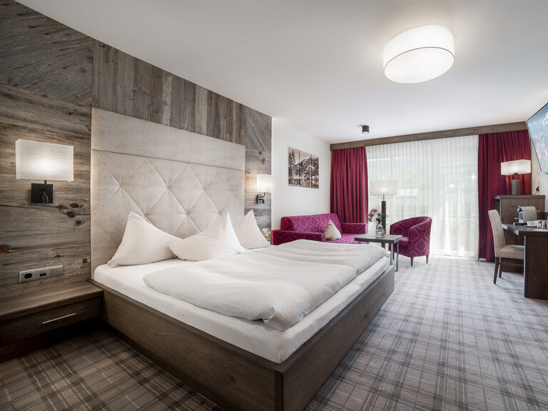 Kuschelsuite mit pinken Einrichtungselementen